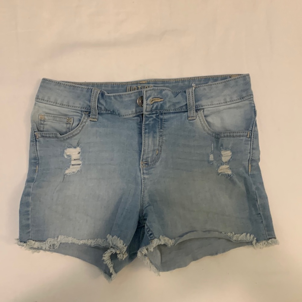 Never worn blue short jeans.